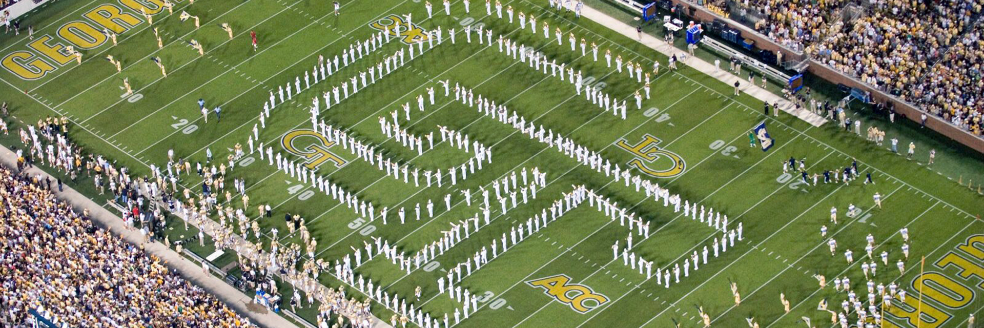 The Marching Band in formation at a football game.