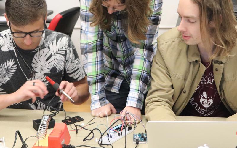 Students work on a hardware project